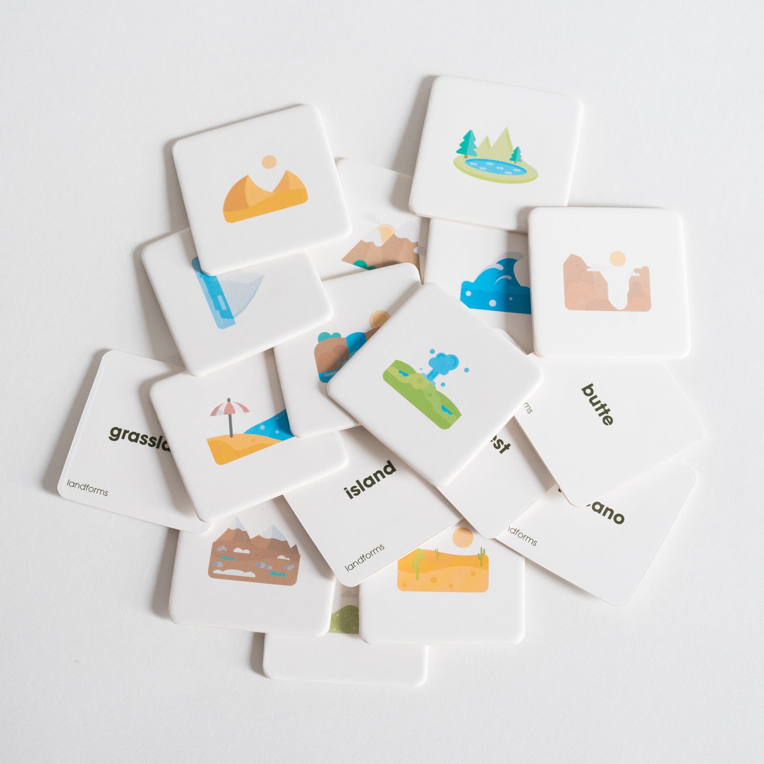 Landforms Pack tiles arranged loosely in a pile on white background